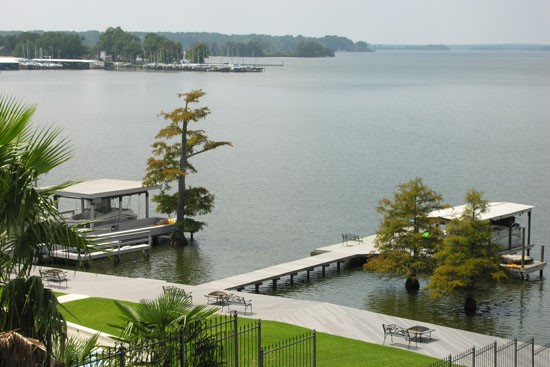 Chimney Hill Apartment Top Balcony View Overlooking Stunning Lake, and Boat Docking